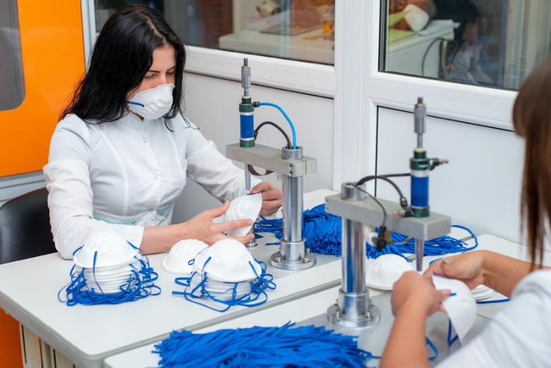 woman making medical mask