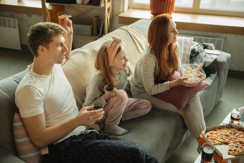 family watching tv together